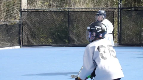 Hobby Kids inline skating skaters Roller Hockey game stadium sport court Stock Footage 86135018