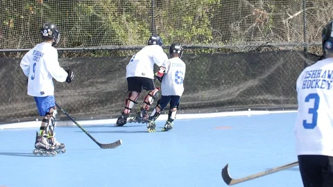 Hobby Kids inline skating skaters Roller Hockey game stadium sport court Stock Footage 86135064