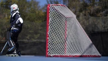 Hobby Kids inline skating skaters Roller Hockey game stadium sport court Stock Footage 86136209