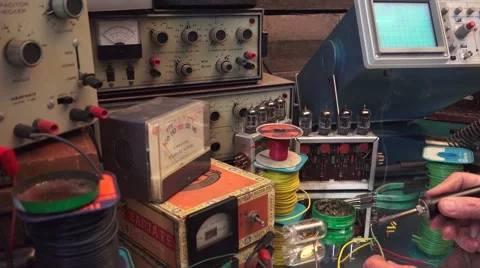 Hobby, tinning wire to use next job, garage inventor working Stock Footage 54618656