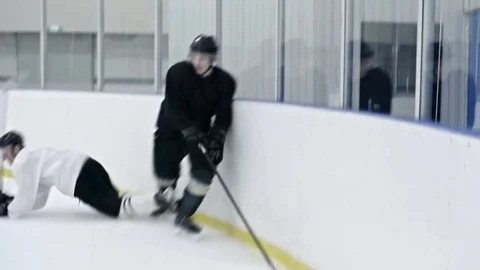 Hockey Forward Boarding Opponent during Game Stock Footage