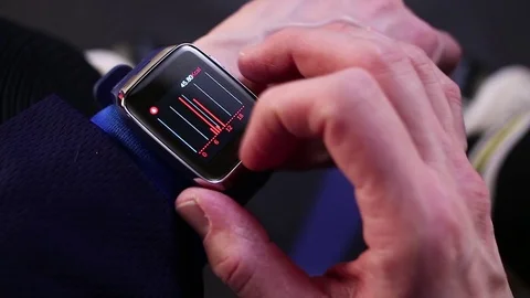 Hockey player checking activity on smartwatch. 스톡 동영상 70331608