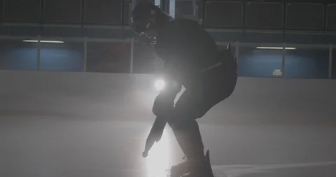 Hockey Player Standing Centre Ice Crouching Down Stock Footage 101405031