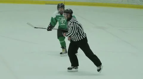 Hockey Referee Skates down ice. Stock Footage 10837043