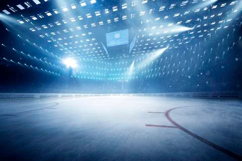 Hockey stadium with fans crowd and an empty ice rink Stock Photos