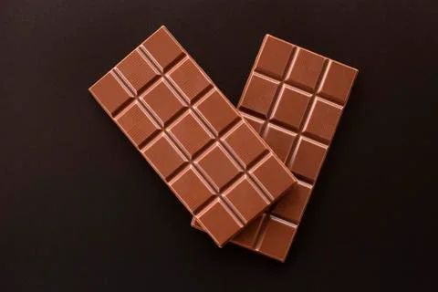 Hocolate on a dark background. Fotos de archivo