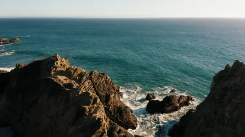 Hoghway one west coast california bay beach cliff rocks coastline aerial drone Stock Footage 153495590