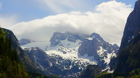 Hoher Dachstein mountains with white cloud and snow Stock Footage 31878771