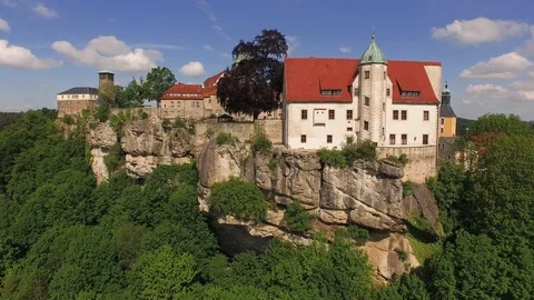 Hohnstein Castle on sandstone cliff surrounded with green lush Video stock 116198678