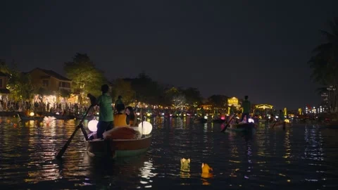 Hoi An Lantern Boat Tour on Thu Bon River at Night, Vietnam Stock Footage 334697550