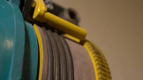 The hoist elevator wire rotates and then stops Stock Footage 220713166