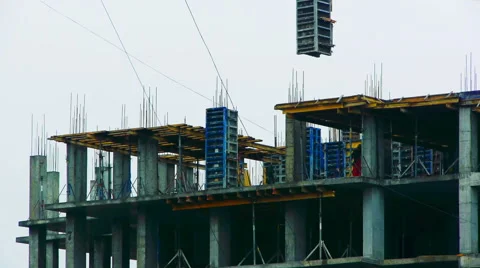 Hoist moves the plate in the construction of high-rise building, Timelapse Stock Footage 66911161