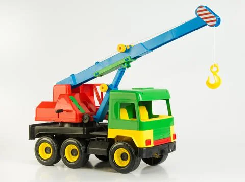 Hoisting crane. Multi-colored plastic toy cars for children. 写真素材