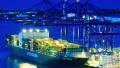 hoisting cranes loading cargo freighter ship timelapse night to day HD Footage