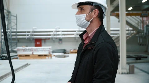 Hoisting a yellow remote control Video stock 128934515