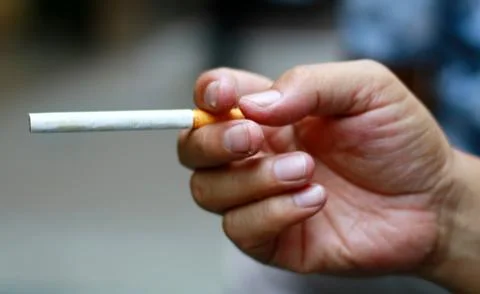Hold cigarette Stock Photos
