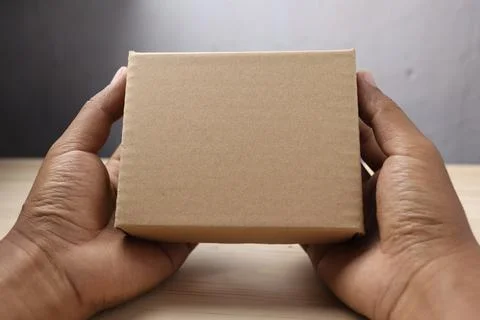 Hold corrugated box for packaging Stock Photos
