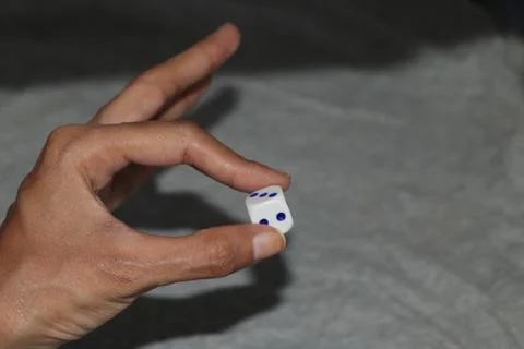 Hold dice in the hand Stock Photos