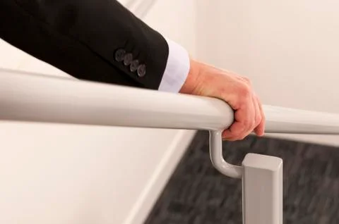 Hold the handrail Stock Photos