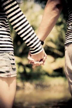 Hold the hands of couple Stock Photos