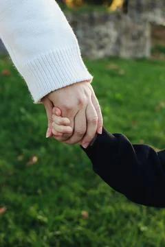 Hold hands Stock Photos