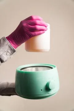 Hold jar sugar paste to warm vertically photo Stock Photos