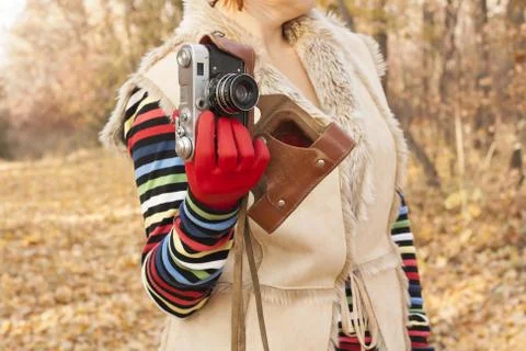 To hold the old camera in hand Stock Photos