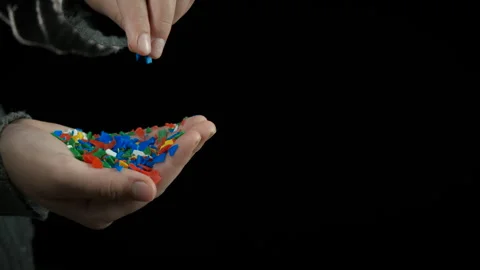 Hold plastic fragments Stock Footage 301514523