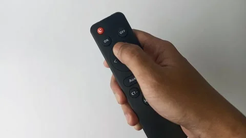 Hold remote LED lamp Stock Footage 312841568