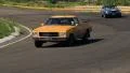 Holden 48-215 FX outraces Ford Mustang Convertible in racing vintage retro cars HD Footage