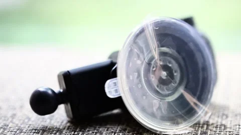 Holder for mobile devices on a suction cup Stock Footage 322578238