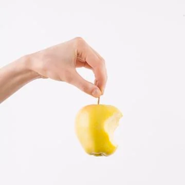 Holding apple Stock Photos