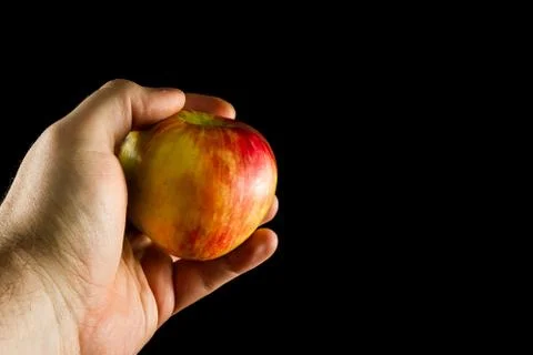 Holding an apple Foto stock
