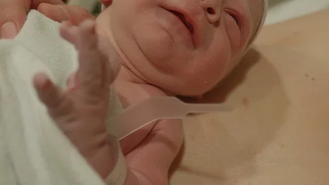 Holding Babys Hand for the First Time Vídeos de archivo 91353364