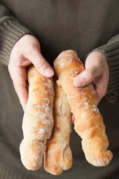 Holding baguettes Stock Photos