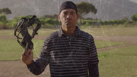 Holding baseball glove, man with network connections animation overlay in Stock Footage 305685887