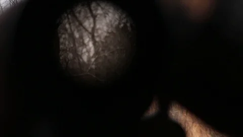 Holding a binoculars Video stock 104975668