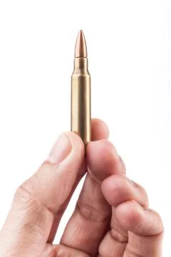 Holding up Bullet Stock Photos