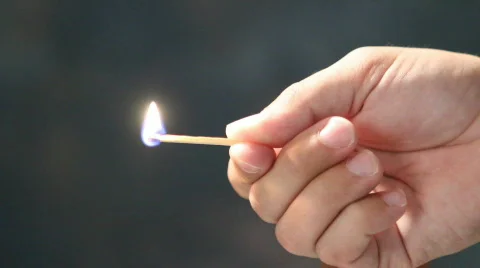 Holding Burning Match Stock Footage 836936