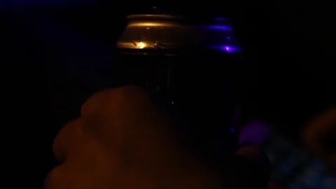 Holding the can of beer Stock Footage