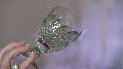 Holding a clear glass Stock Footage 86280344