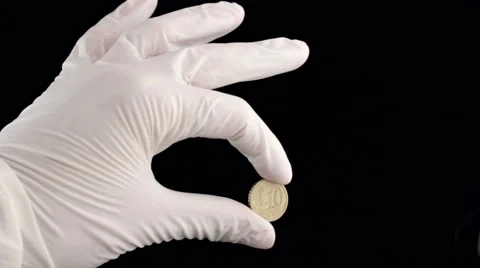 Holding A Coin Stock Footage 56378301
