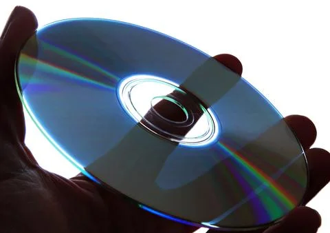 Holding a compact disc in hand Stock Photos