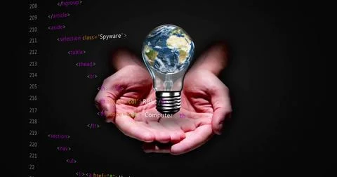 Holding cupped hands presenting in studio, cradling glowing bulb with Earth and Stock Photos