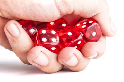 Holding Dices Stock Photos