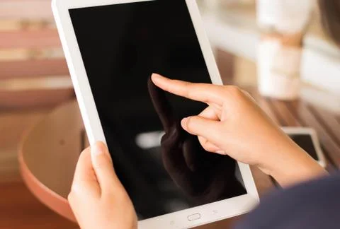 Holding digital tablet Stock Photos