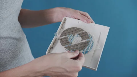 Holding Dusty Air Vent Mesh Filter Showing Heavy Accumulation 스톡 동영상 341398002