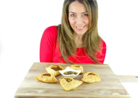 Holding empanadas Stock Photos