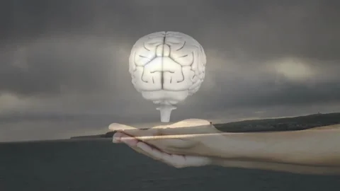 Holding floating brain over stormy ocean, hand creating animation effect Stock Footage 305864459