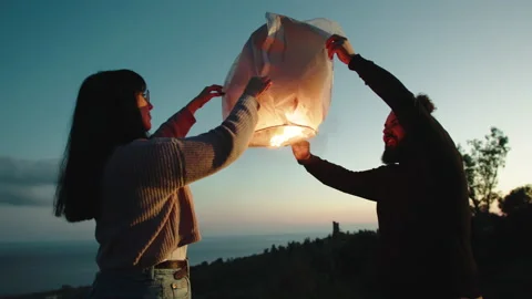 Holding The Flying Lantern for valentine's day Stock Footage 231720039